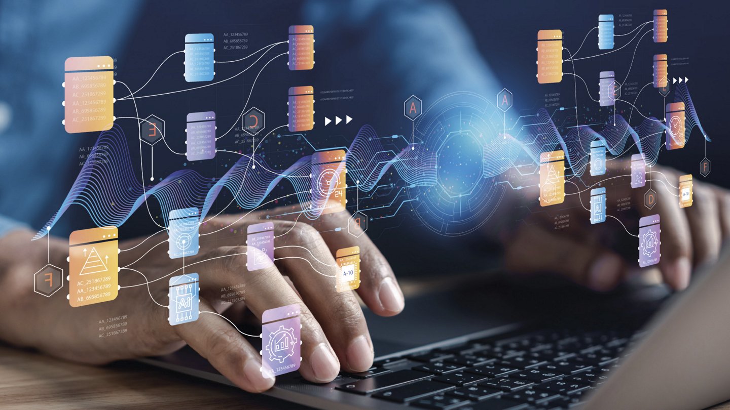 Das Bild zeigt eine visuelle Darstellung von Digitalisierung, Robotik und Künstlicher Intelligenz (KI). Im Vordergrund sind Hände auf einer Tastatur zu sehen, während darüber eine futuristische, digitale Netzwerkstruktur mit Datenknoten, Algorithmen und Verbindungen schwebt. Dies symbolisiert die digitale Transformation, Datenverarbeitung und die Automatisierung durch KI-Technologien. Die dynamischen Linien und vernetzten Elemente verdeutlichen den Fluss von Informationen und digitalen Prozessen.